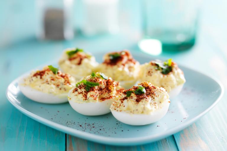 Healthier Deviled Eggs A plate of deviled eggs.