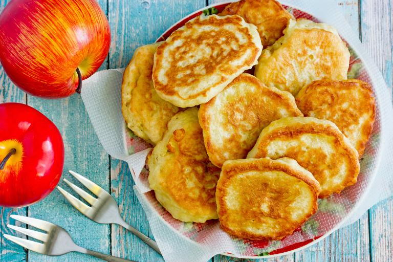 a plate of freshly made apple pancakes