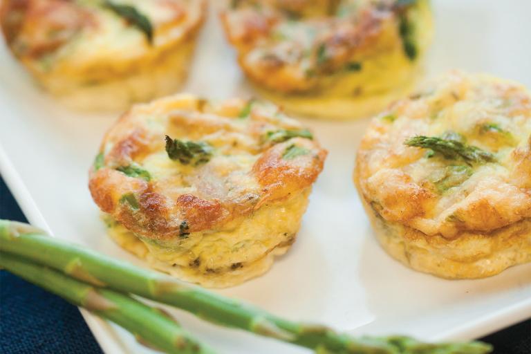 Asparagus, Spinach, and Chicken Sausage Frittata A plate of home-made mini-frittatas with asparagus, spinach, and chicken sausage