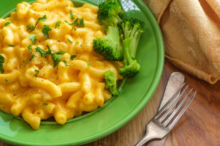 Broccoli Mac & Cheese a plate of cheesy macaroni with broccoli