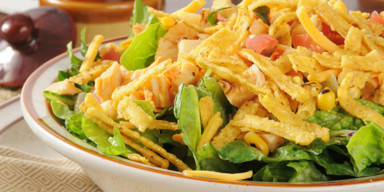 Spicy "Taco" Salad a plate of seasoned filling and tortilla strips